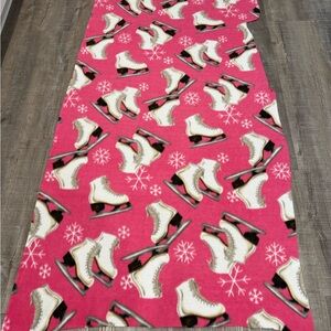 Fleece fabric ultra soft fleece pink with white ice skates on it